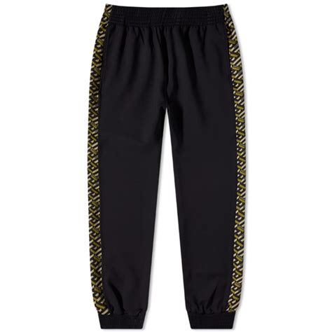 black versace pants|Versace track pants.